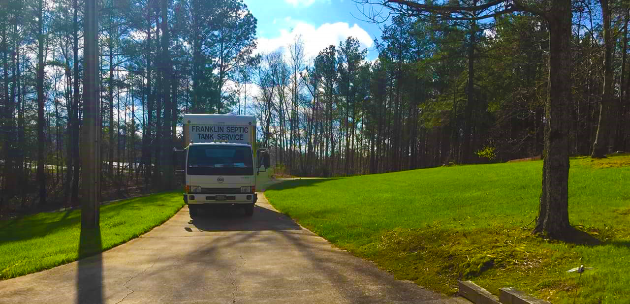 Franklin Septic Tank Service truck — front view